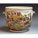 A jardiniere painted with boat, hunting and bacchanalian scenes,