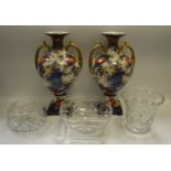 Ceramics and Glass - a pair of twin-handled baluster shaped vases on square pedestal bases;