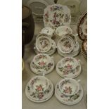 A Wedgwood floral/butterfly pattern part tea service , 10 cups and saucers, side plates,