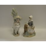 Lladro - a Lladro figure of a girl and a goat; another,