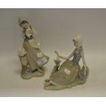 Lladro - a Lladro figure of a girl holding and feeding a pigeon;