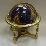 A semi-precious stone globe
