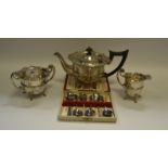 A three piece silver tea set, wavy edge, shell and pad feet, Birmingham 1918, 22.75 oz.