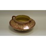 A Hispano-Moresque copper lustre jug, of squat proportions,