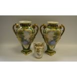 A pair of Noritake baluster shaped vases painted to centre with rural scenes;