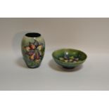 Moorcroft - a small ovoid tube lined Orchid pattern vase;