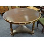 A Victorian mahogany centre table, circular moulded top, cockbeaded frieze, three turned supports,