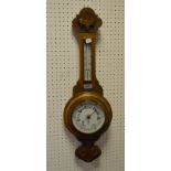 An early-20th century oak banjo barometer,