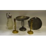 An Art Nouveau pewter plate impressed with a Maiden; a hammered pewter table centrepiece;