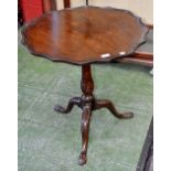 A George III mahogany and fruitwood tripod occasional table, piecrust top on birdcage support,