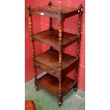 A George IV mahogany rectangular four-tier whatnot, turned finials and supports, drawer to apron,