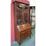 A George III Revival mahogany bureau bookcase,