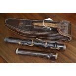 A 19th century two piece piccolo, silver plated mounts,