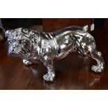 A silver coloured model of a bulldog 28cm high x 43cm long.