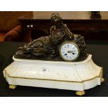 A French Second Empire dark patinated bronze mounted figural mantel clock,