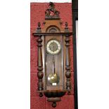 A Victorian mahogany Vienna wall clock, horse rampant to pediment, enamelled chapter ring,