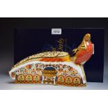 A Royal Crown Derby paperweight, The Golden Pheasant, gold stopper, 27cm wide,
