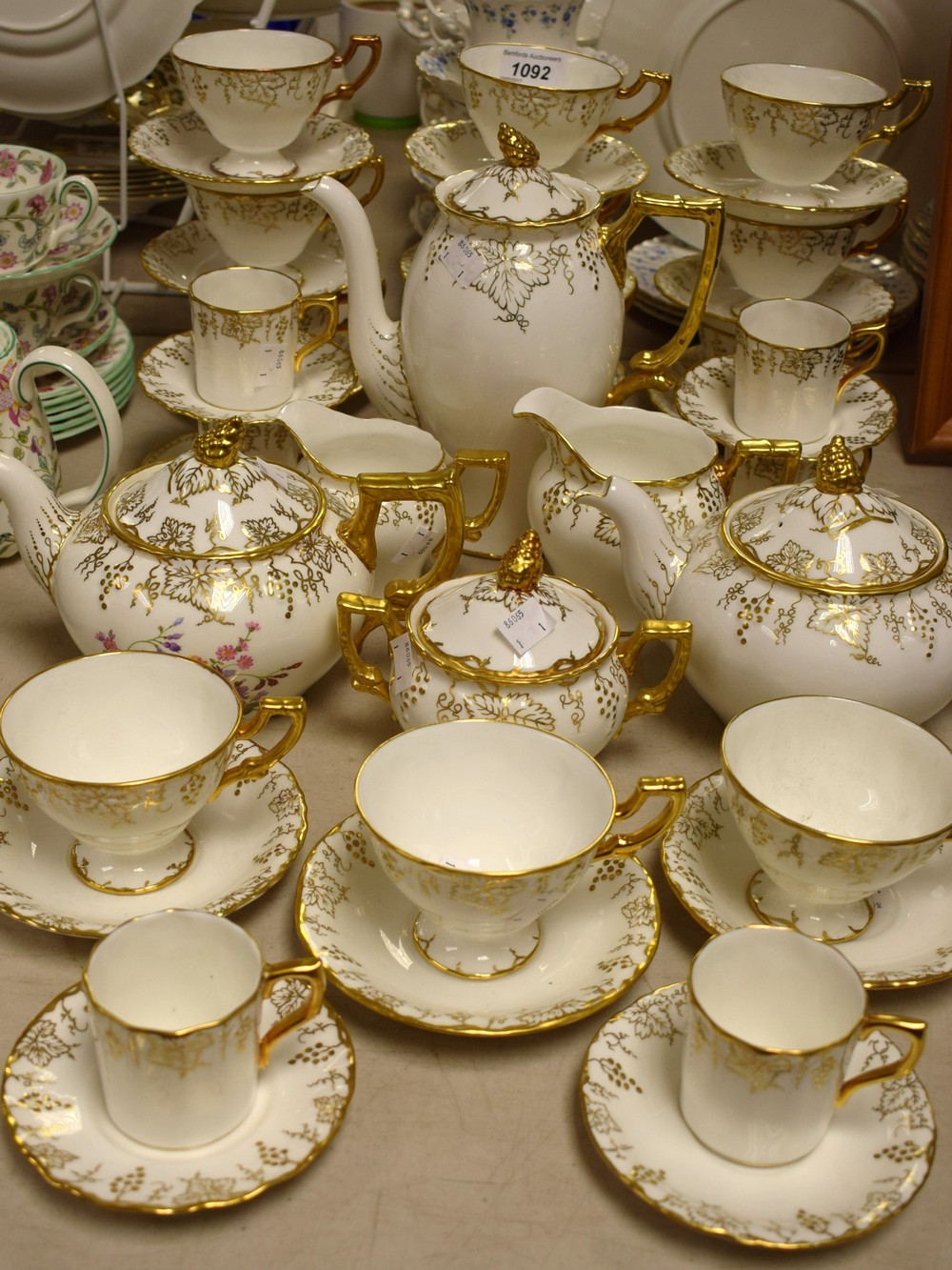 Royal Crown Derby Vines - a coffee set comprising coffee pot, six coffee cans, five Vines saucers,