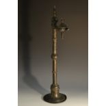 A 19th century Indian/Tibetan bronze oil lamp,