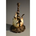 A 19th century cast and wrought iron desk weight, as an acanthus bud, wrythen posted handle,