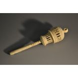 A 19th century bone child's rattle, pierced fretwork baluster barrel,