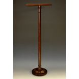 A 19th century mahogany gentleman's towel stand, T-shaped cresting, turned domed base,