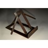 A 19th century mahogany folding table-top reading stand, adjustable on a ratchet,