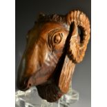 A 19th century Anglo-Indian hardwood wall boss, boldly carved as ram's head, 31cm high, c.
