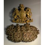 A 19th century copper coats of arms, embossed with German armorial bearings, 23cm wide; another,