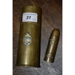 A World War Two Trench Art shell lighter;