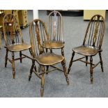 A set of four mid 20th century Old Charm style elm spindle back kitchen chairs (4)