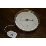 A Victorian brass cased holosteric barometer