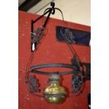 A pair of Art Nouveau hanging oil lamps, wrought iron,