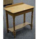 A Victorian painted pine hall table, galleried top, deep frieze, turned supports,