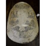 A faux turtle shell scrimshaw,