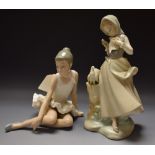 A Lladro figure, Girl With Doves; a Lladro figure,