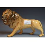 A Beswick model, Male Lion Walking,