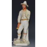 A Royal Worcester figure, of an Italian, he stands wearing a pointed hat, holding a horn,