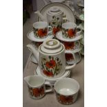 A retro J & G Meakin Poppy pattern tea set, including cups and saucers, side plates, etc.