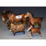 A Beswick Stocky Jogging Mare model; others, shire foal; a Shebeg Pottery sheep,