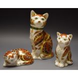 A Royal Crown Derby Cat Family Marmaduke, Marmalade and Marmelo, all gold stopper,