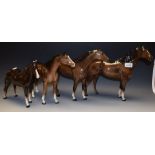 A Beswick model large Hunter, model no 1734, brown gloss; another large Racehorse,model no 1564.