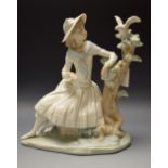 A Nao Spanish porcelain figure, Playing With Doves, Daisa,