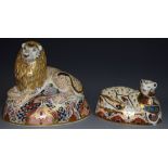 A Royal Crown Derby paperweight, Lion Cub, commissioned by Sinclairs, 110/1500, gold stopper,