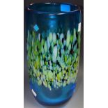 A turquoise blown glass art vase, yellow, black and white inclusions,