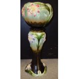 An Art Nouveau style jardiniere and stand