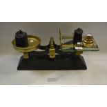 A set of Victorian counter Roberval beam scales, glass platform, brass fittings,