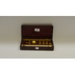 A Sikes Hydrometer, the mahogany case fitted with bone cartouche, manufactured by L.