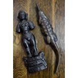 A 19th century carved wood Indian deity figure;