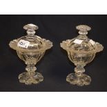 A pair of Victorian cut glass sweetmeat bowls and covers